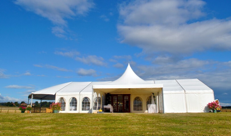2014 Wedding marquee 12 x 18m with a hip end, decking and a Chinese hat entrance porch